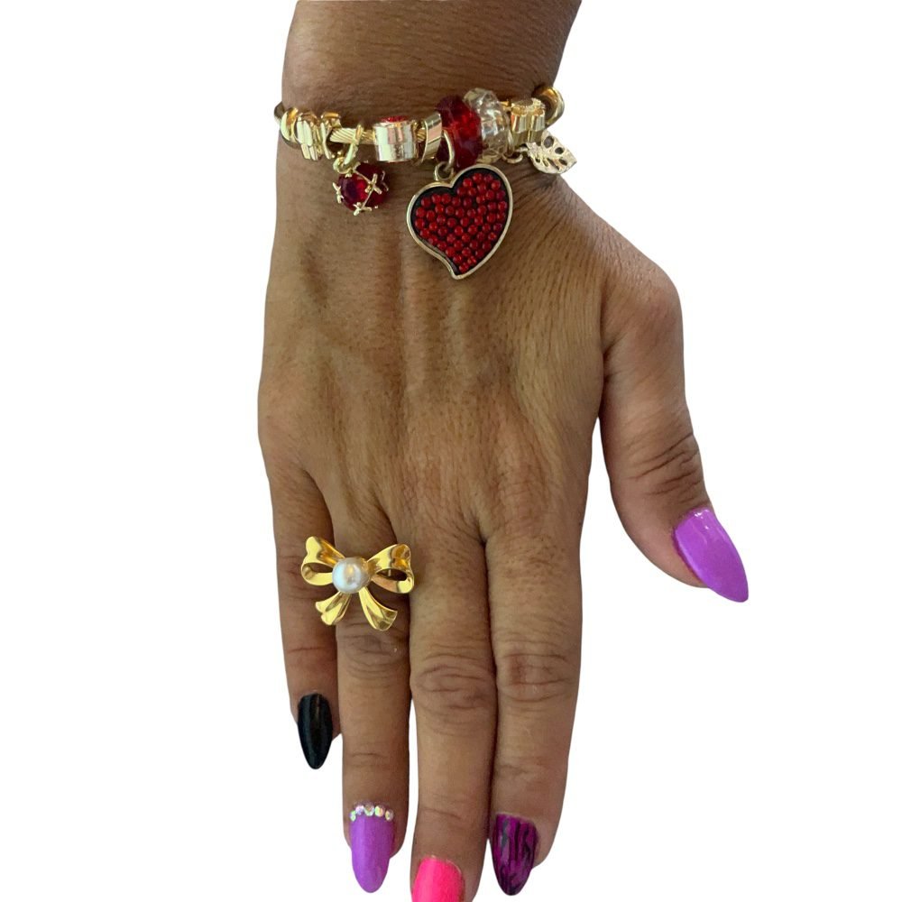 Ατσάλινο δαχτυλίδι σε χρυσό χρώμα με σχέδιο φιογκάκι - Image 2