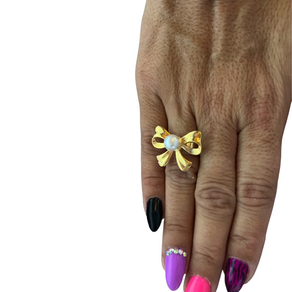 Ατσάλινο δαχτυλίδι σε χρυσό χρώμα με σχέδιο φιογκάκι