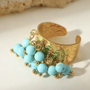 Ατσάλινο δαχτυλίδι με απομίμηση μαργαριταριού σε βεραμάν χρώμα και ασπρό χρώμα